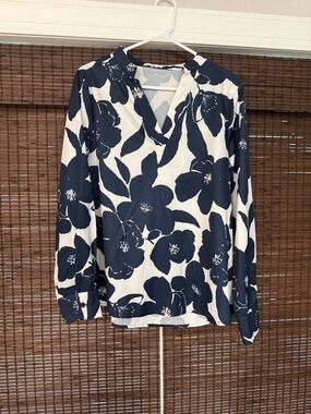 Navy Blue and White floral blouse. Fantastic for business or casual. Drapes well